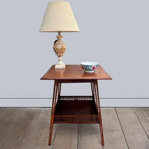 An original walnut occasional table stamped and numbered by JAMES SHOOLBRED & Co.  circa 1890.